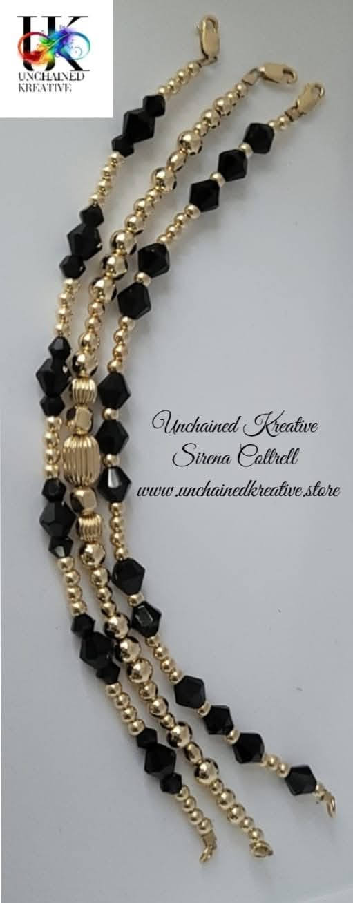 2 birthstone and 1 all gold bracelet